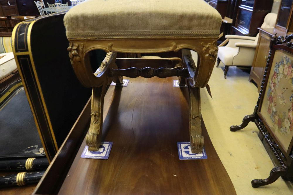 A 19th century giltwood X frame dressing stool, width 60cm, depth 40cm, height 46cm